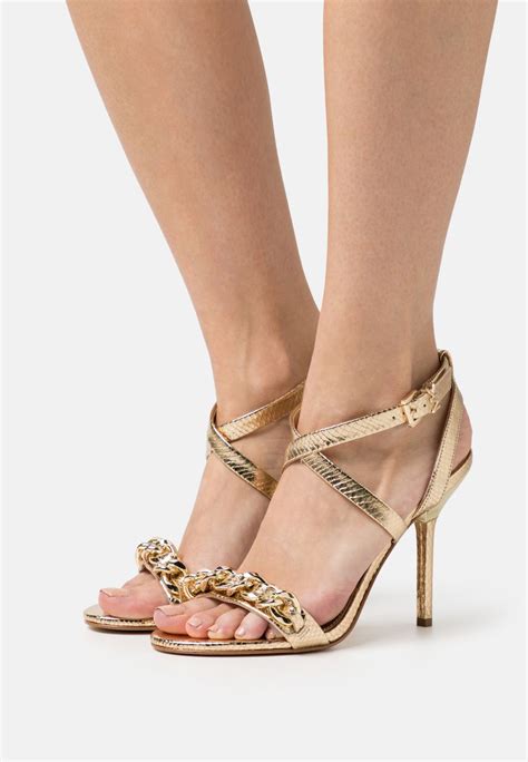 michael kors gold high heels|Michael Kors heeled boots.